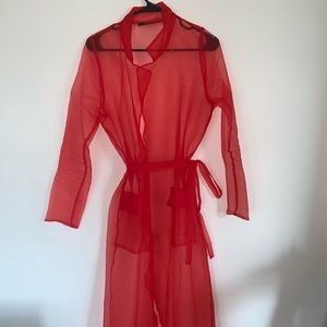 Sheer red trench coat